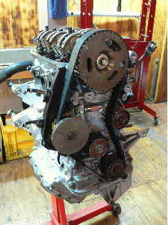 �^�C�~���O�x���g�F�G���W���I�[�o�[�z�[��